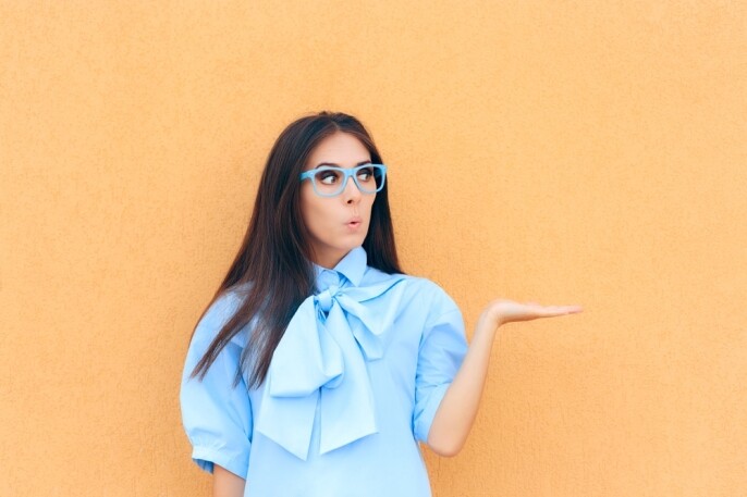 Woman holding out her hand